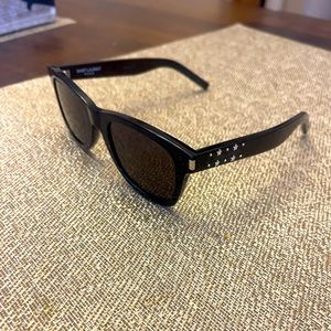 Saint Laurent sunglasses. Black with stars on both  sides